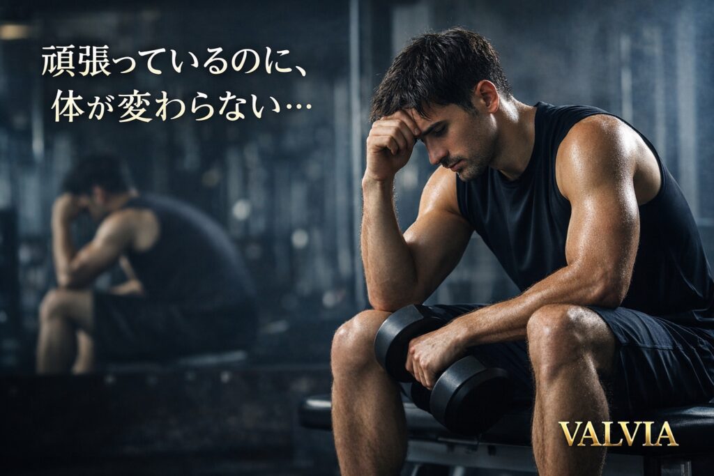 筋トレを続けているのに体が変わらず、ジムで悩む男性